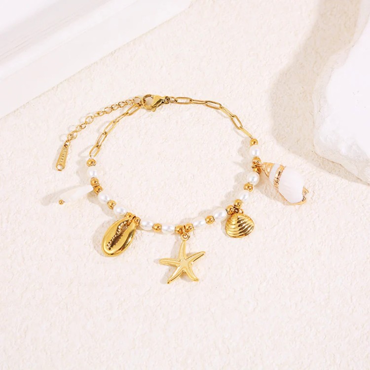 Bracelet perles breloques coquillage et étoile de mer - Acier inoxydable Bracelet perles breloques coquillage et étoile de mer - Acier inoxydable